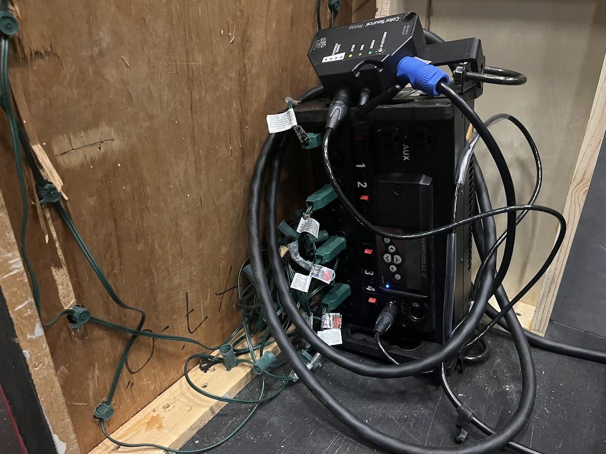 Dimmer pack and wireless DMX used to control practical lighting on Hot Box wagon